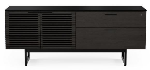 Whether as a standalone storage credenza or as part of a complete Corridor office set-up, the elegant Corridor 6529 provides abundant storage with two locking storage drawers and an adjustable storage compartment concealed by beautiful stained hardwood louvered doors. A locking file drawer keeps records organized and in easy reach. Rounding out this attractive design is a highly durable and unbelievably soft black satin-etched glass top that is resistant to dings, scratches, and fingerprints.