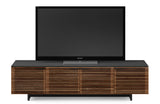 Perfectly sized for home theater systems with a large television, this modern TV stand and entertainment center packs a ton of innovative features into its low profile design, including an integrated soundbar shelf, remote-friendly and acoustically-transparent louvered doors, built-in cable management, adjustable shelves, hidden wheels, rear access panels and an unbelievably soft and durable satin-etched glass top. Part of the award-winning Corridor Media Collection.