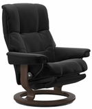 Black recliner chair with wooden base.