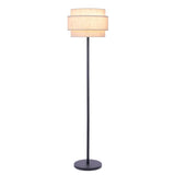 Floor lamp with a beige lampshade and black metal frame on a white background