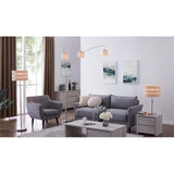 Modern living room with gray sofa, armchair, and floor lamps.