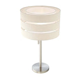 Table lamp with a beige fabric shade and metal base