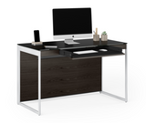 Innovative modern design gives the Sequel 20 Compact Desk bold functionality with seemingly limitless placement options. Designed for smaller spaces—yet full of innovative features—this compact desk includes a multifunctional keyboard drawer and wire management system that helps to provide an organized and efficient workstation in a compact design.