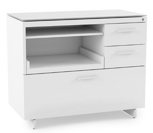 Extend your work surface with the Centro Return 6402. The Return attaches to Centro Desk 6401, 3-Drawer File Cabinet 6414, Lateral File Cabinet 6416, and Multifunction Cabinet 6417 with sturdy steel connections, and is topped with a highly durable and uniquely soft grey satin-etched tempered glass surface.