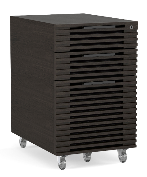 The Corridor 6507 mobile file pedestal is a highly functional and stylish portable cabinet that fits neatly underneath the Corridor 6521 Executive Desk. The 6507 includes three drawers - two storage and one file drawer - which can all be secured by a single lock. Locking wheels allow the cabinet to be easily moved and locked in place.