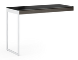 Partnered with the Sequel 6101 Desk, or used alone as a compact laptop desk when connected to a compatible Sequel storage cabinet, the Sequel 6112 Desk Return provides a slim and highly functional workspace. The understated frame maneuvers easily to coordinate with other pieces, bringing exceptional versatility to a small office space. The satin-etched glass top and elegant hardwood veneer make the Return decidedly stylish, delivering impressive fashion to match its elite functionality.