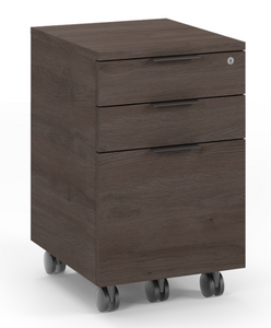 The Sigma 6907 mobile file cabinet features a low profile that is designed to fit neatly under the Sigma 6901 desk and can be used for general storage of files and everyday office items or as a compact printer stand. This attractive locking filing cabinet rests on locking casters and features two supply drawers and a letter/legal file drawer.