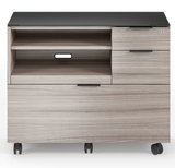 The Sigma 6917 multifunction cabinet is designed to maximize compact office spaces and is designed with convenient features such as a push-to-open printer tray, an adjustable shelf for paper storage, two storage drawers and a lateral file drawer. This modern file cabinet is topped with highly durable and unbelievably soft black satin-etched tempered glass that resists dings, scratches, and fingerprints.